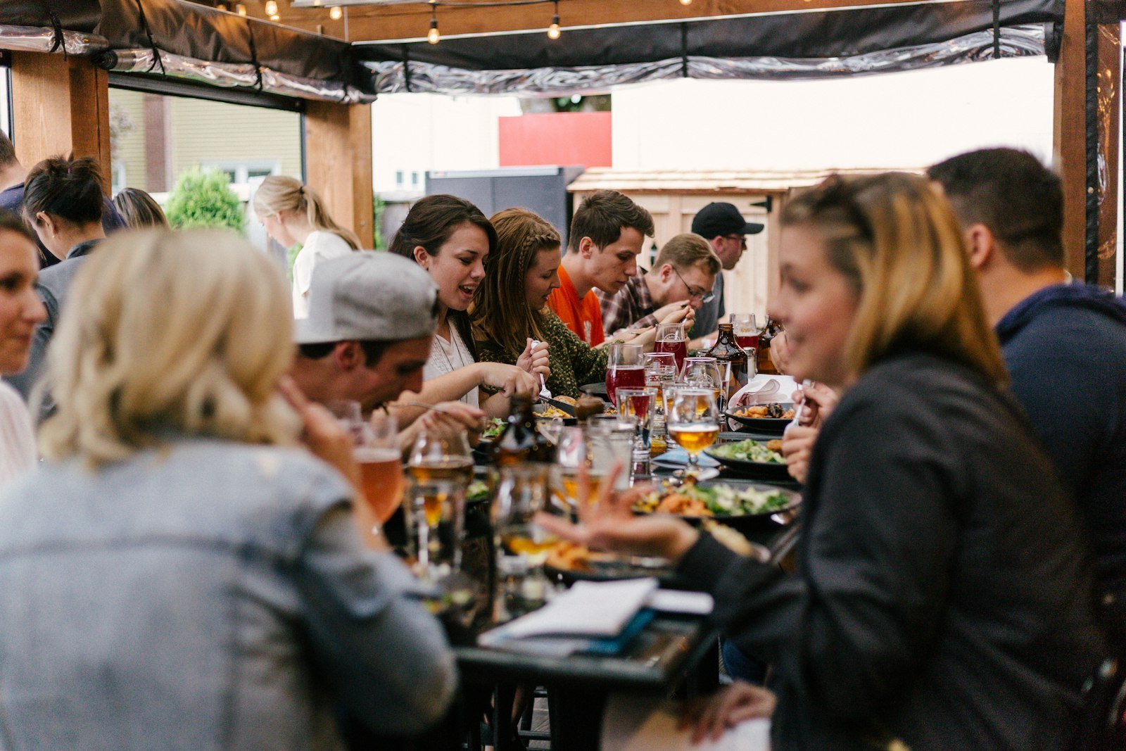 People gathered outside a neighborhood café on Alberta Street