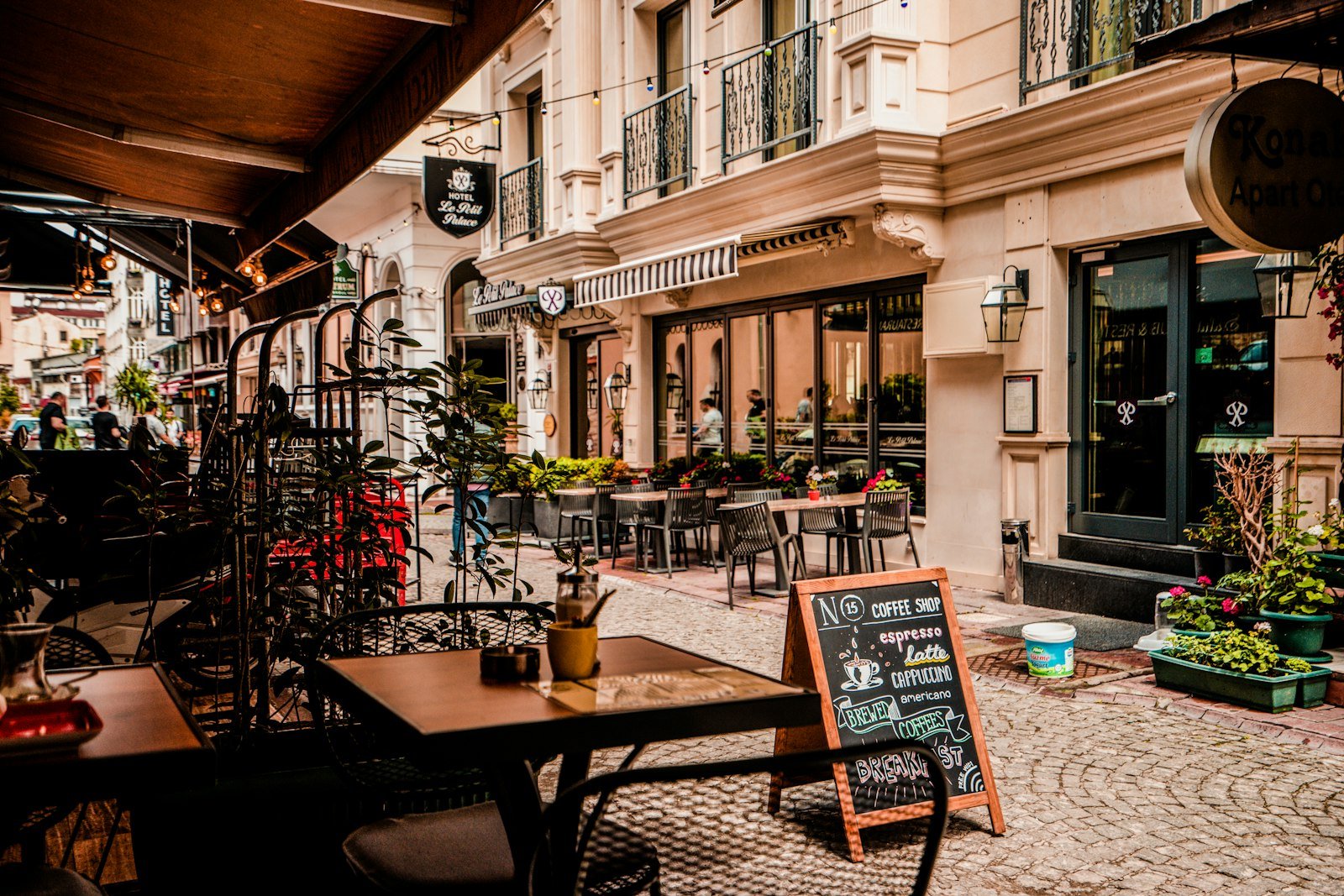 Inviting café storefront with guests inside on Alberta Street