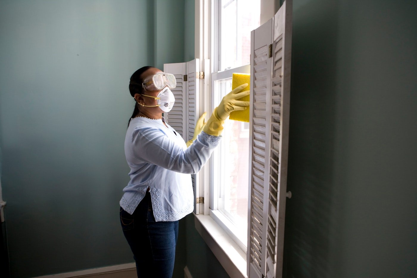 Summit technician speaking with a homeowner in a kitchen